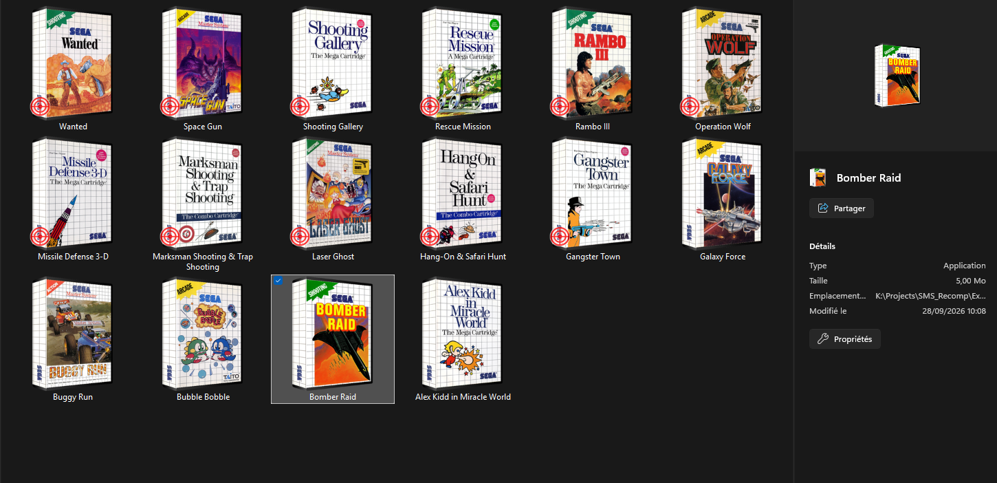 Windows Explorer view showing compiled Master System game executables with 3D clamshell box art icons and red crosshair shooting badges